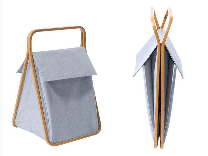 LAUNDRY DOUBLE Portabiancheria con due grandi tasche estensibili e separate per dividere la biancheria chiara e scura. Lavabili ed internamente impermeabili sono realizzate in bamboo listellare laccato e tessuto Navy di cotone e fibra recuperata dalle bottiglie di plastica riciclate accessori arredo bagno Cipí