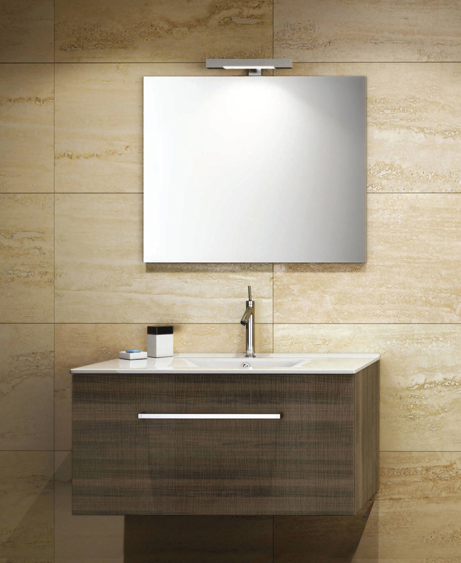 Kio serie La composizione include: base a 1 cassetto con sistema a chiusura ammortizzata, lavabo in ceramica e specchio a filo lucido con lampada a LED. Maniglia in grigio satinato. Disponibile in 2 diverse finiture. finiture disponibili Bianco Lucido o Noce Tranché Mobili Bagno Dianflex Corporation