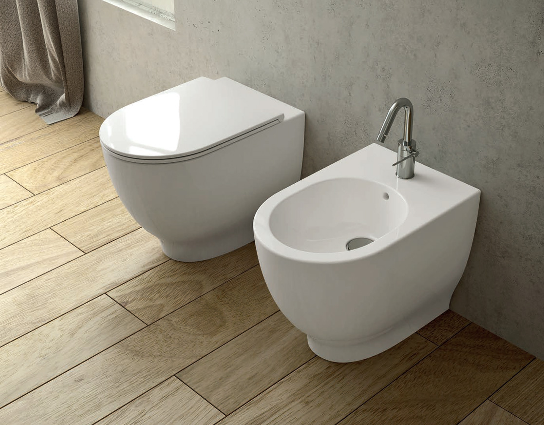 MOON/ASTER RIMLESS serie Sanitari a terra filomuro marchio Rak Ceramics Dianflex